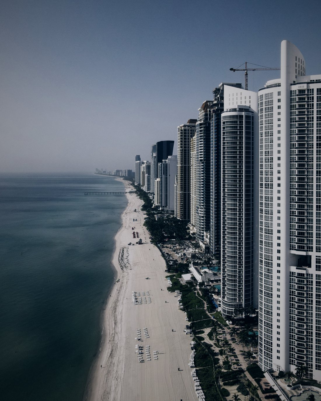 Oceanfront condo towers along Sunny Isles Beach from above